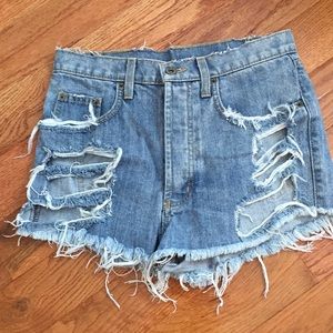 Carmar distressed denim shorts with button front